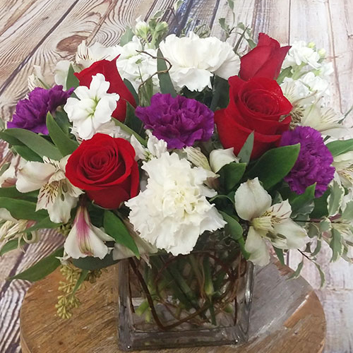 “Abounding Love” A loving bouquet of roses, carnations, alstromeria, and a beautiful selection of stock flowers. $65 and up.