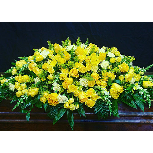 From The Heart Casket Spray with yellow roses