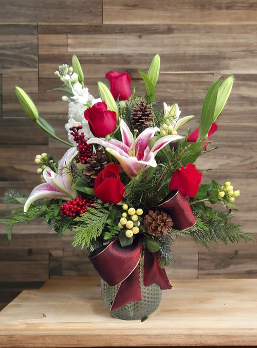 Beautiful Christmas Floral Arrangement by From the Heart Florist